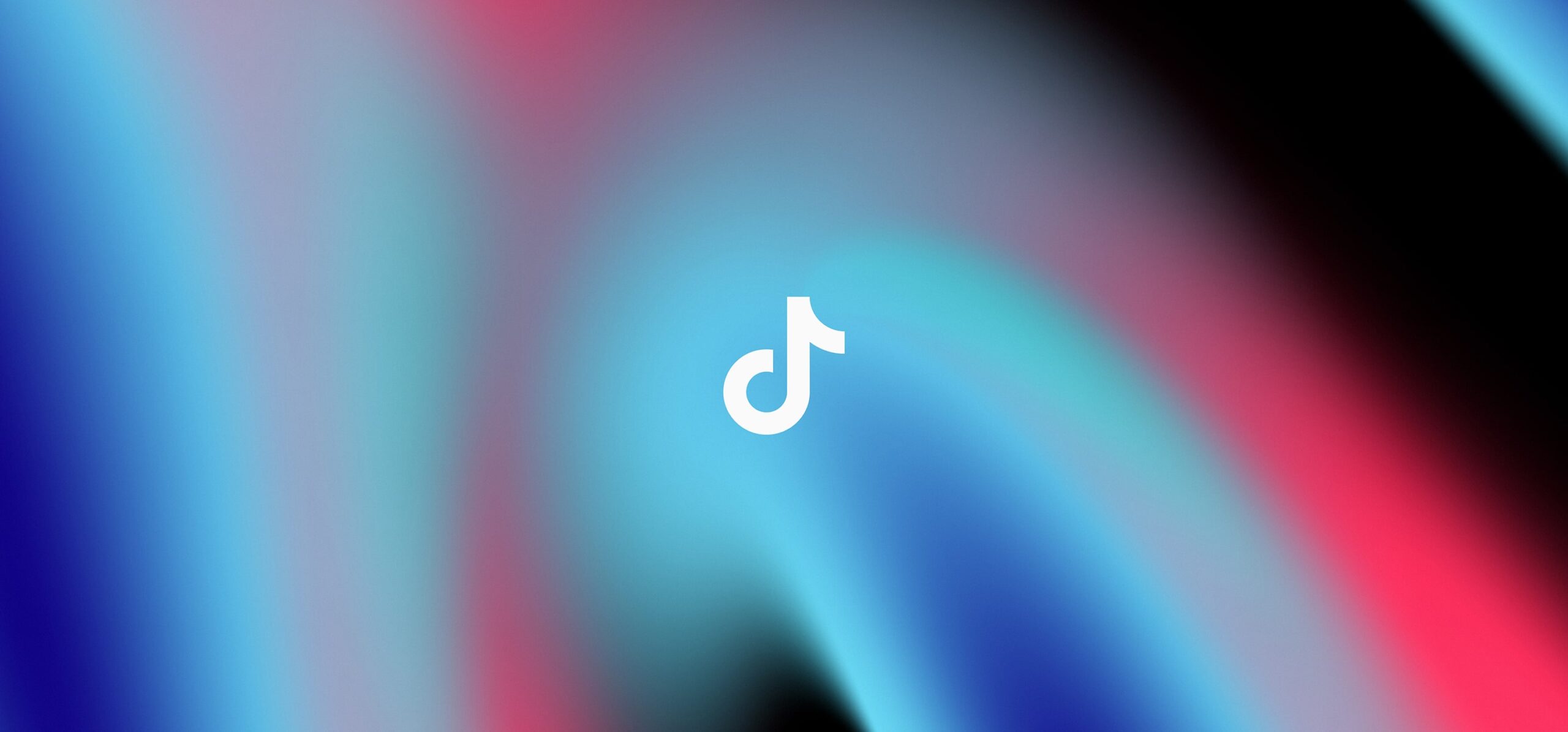 Gradient swirl of blue, pink and black representing TikTok brand colours with TikTok white logo in center